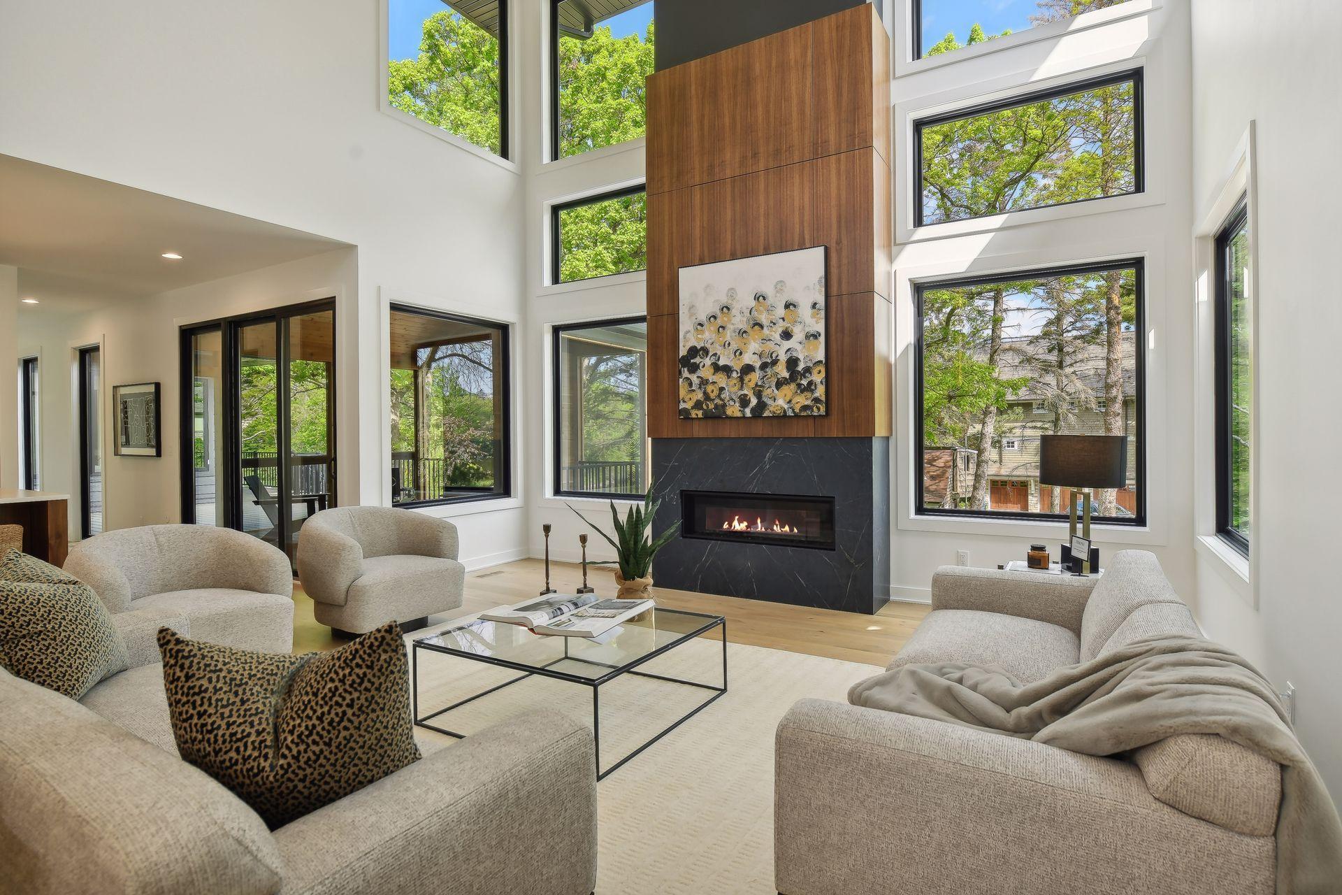 Cozy gas fireplace adds warmth to this modern living space.