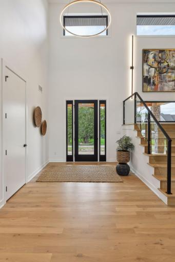 High ceilings create a grand yet inviting ambiance in main spaces.