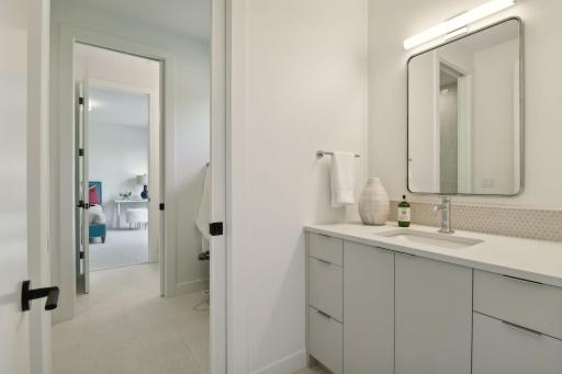 Upper level features a walk-through bathroom.