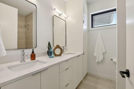 Another custom bath ideal for guests with a double vanity