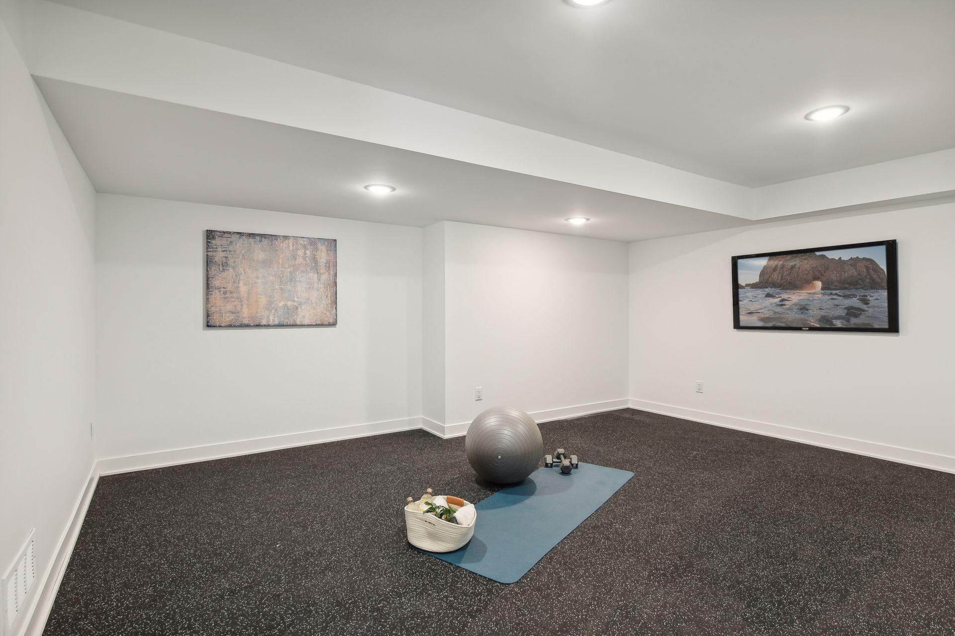 Every home needs a Work-out space and you will have plenty of space to set up all of your equipment in this one.