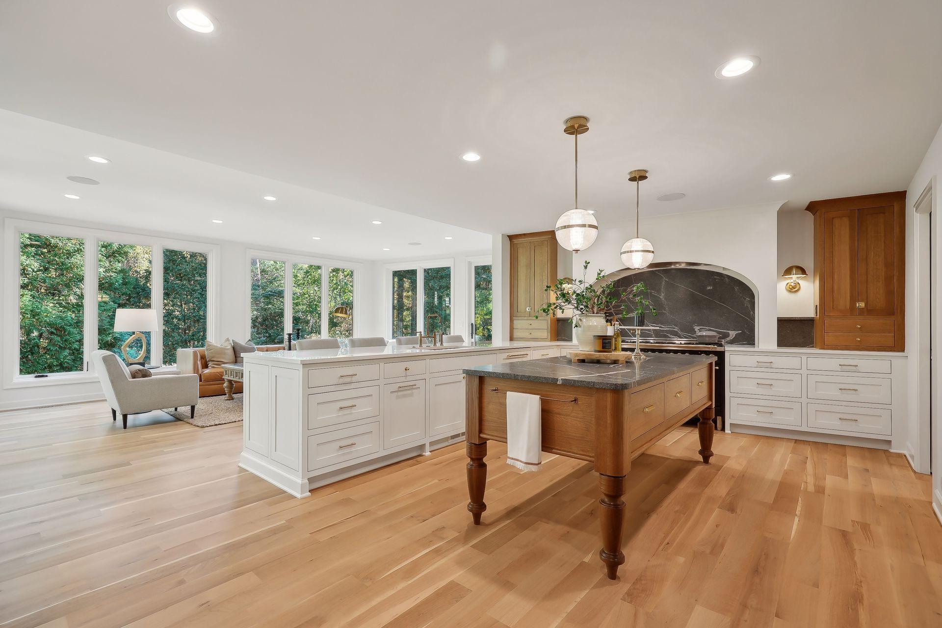 This open kitchen is designed for both style and convenience, featuring inviting bar seating that’s perfect for casual meals or entertaining. Enjoy seamless interaction with family and friends while cooking in this beautiful, functional space!