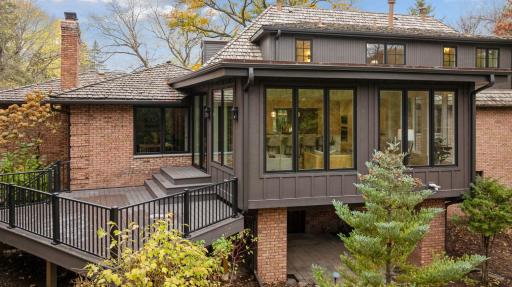 Enjoy effortless indoor-outdoor living with a stunning lower-level walkout leading to a charming 3-season porch. This versatile space invites relaxation and entertainment, offering a perfect retreat for enjoying the fresh air year-round.