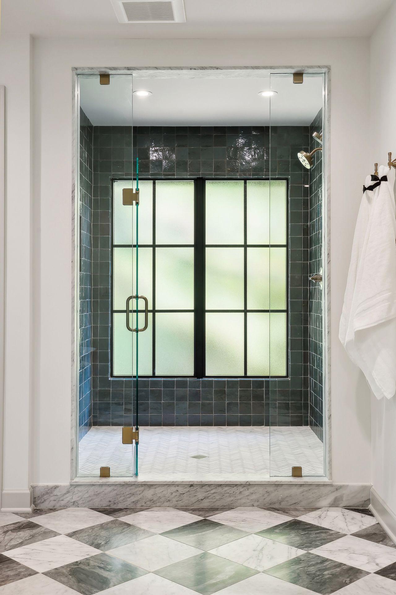 Experience the epitome of luxury with this huge walk-in shower, featuring elegant design and ample space. It offers a spa-like retreat.