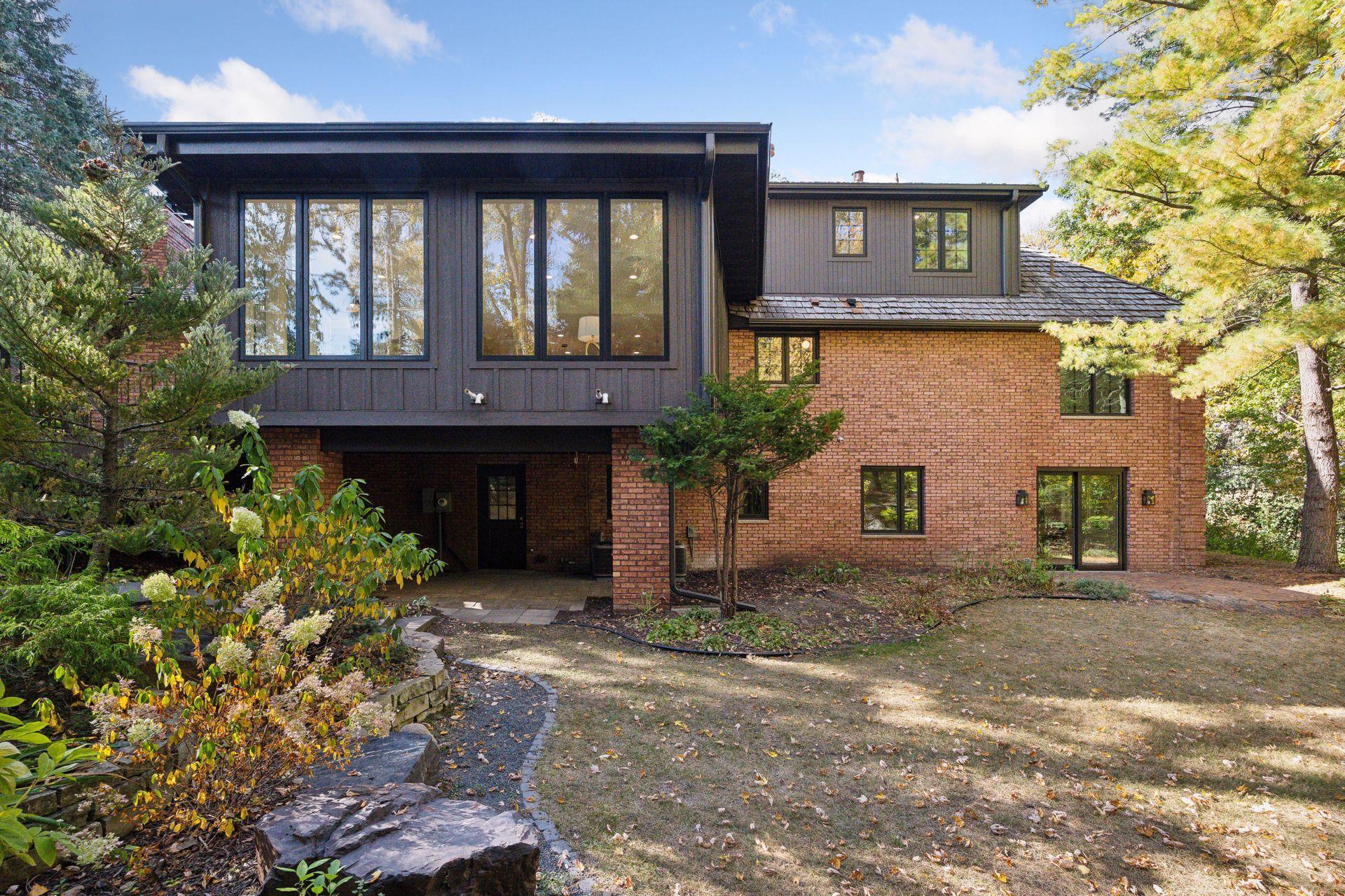 Charming 3-season porch. This versatile space invites relaxation and entertainment, offering a perfect retreat for enjoying the fresh air year-round.