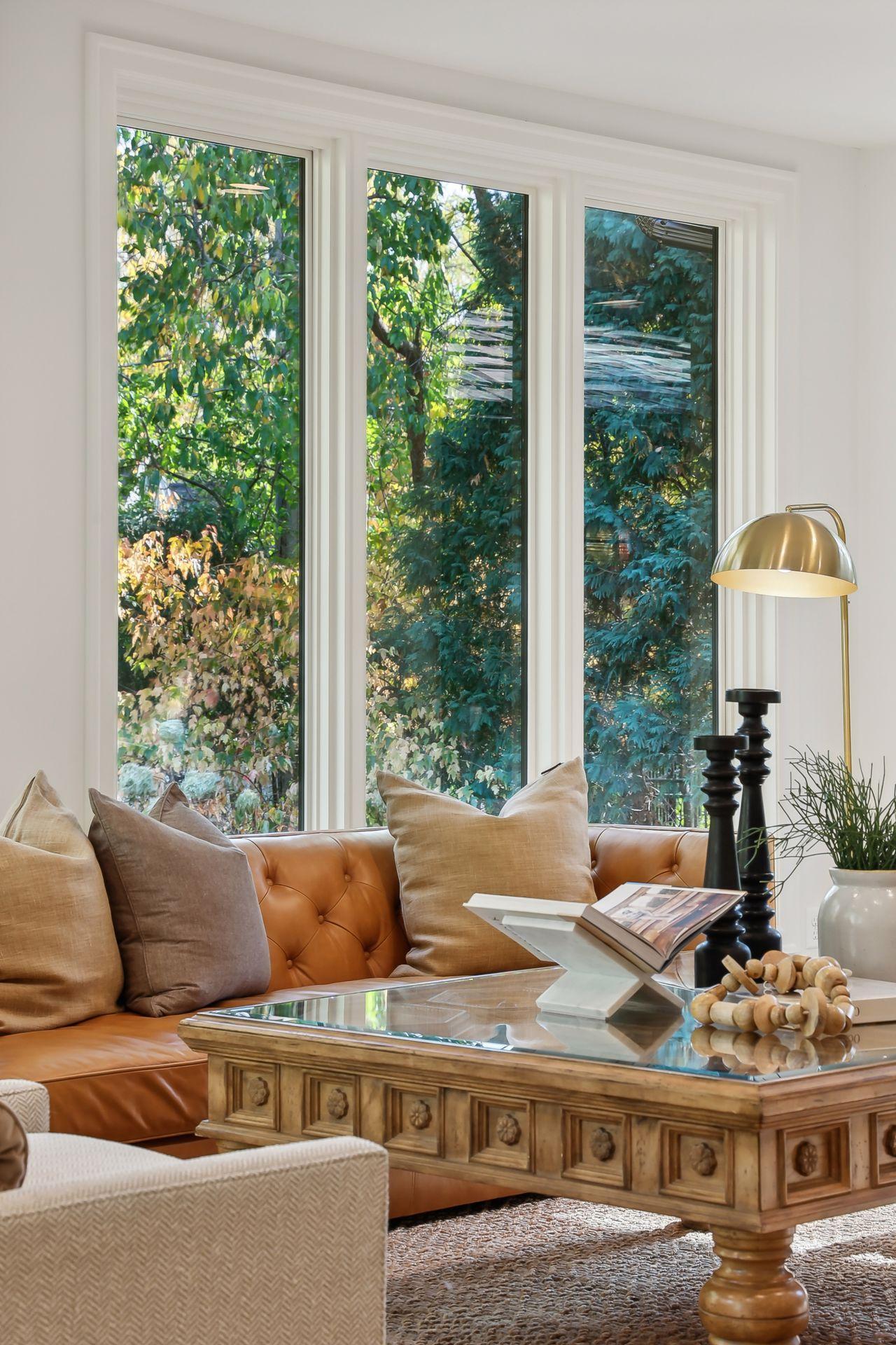 Experience an abundance of natural light streaming through stunning custom windows. This feature not only brightens the space but also enhances the home’s aesthetic, creating a warm and inviting atmosphere throughout.