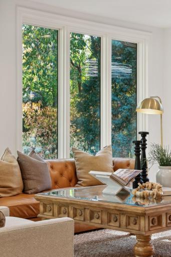 Experience an abundance of natural light streaming through stunning custom windows. This feature not only brightens the space but also enhances the homeâs aesthetic, creating a warm and inviting atmosphere throughout.