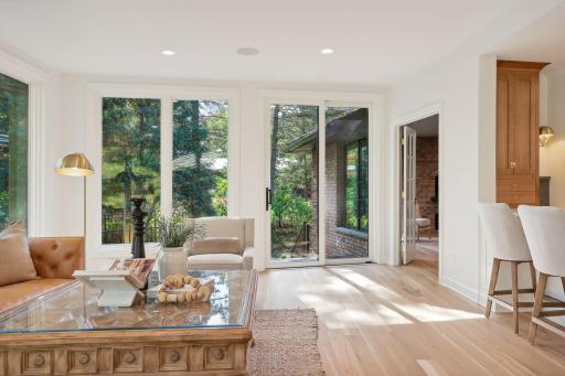 Enjoy effortless indoor-outdoor living with patio doors that lead out to a spacious deck. This inviting transition creates the perfect space for entertaining, relaxing, or soaking up the sun in your own private retreat.