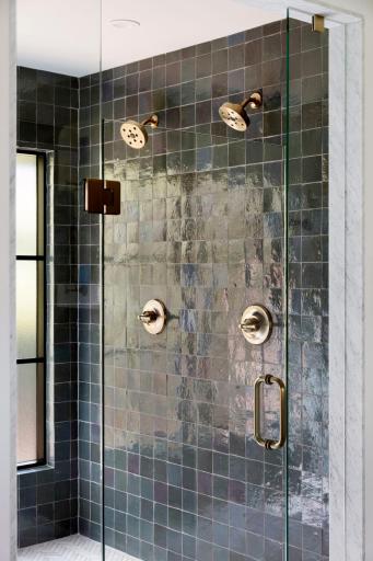 Stylish herringbone tile floor that adds texture and sophistication.