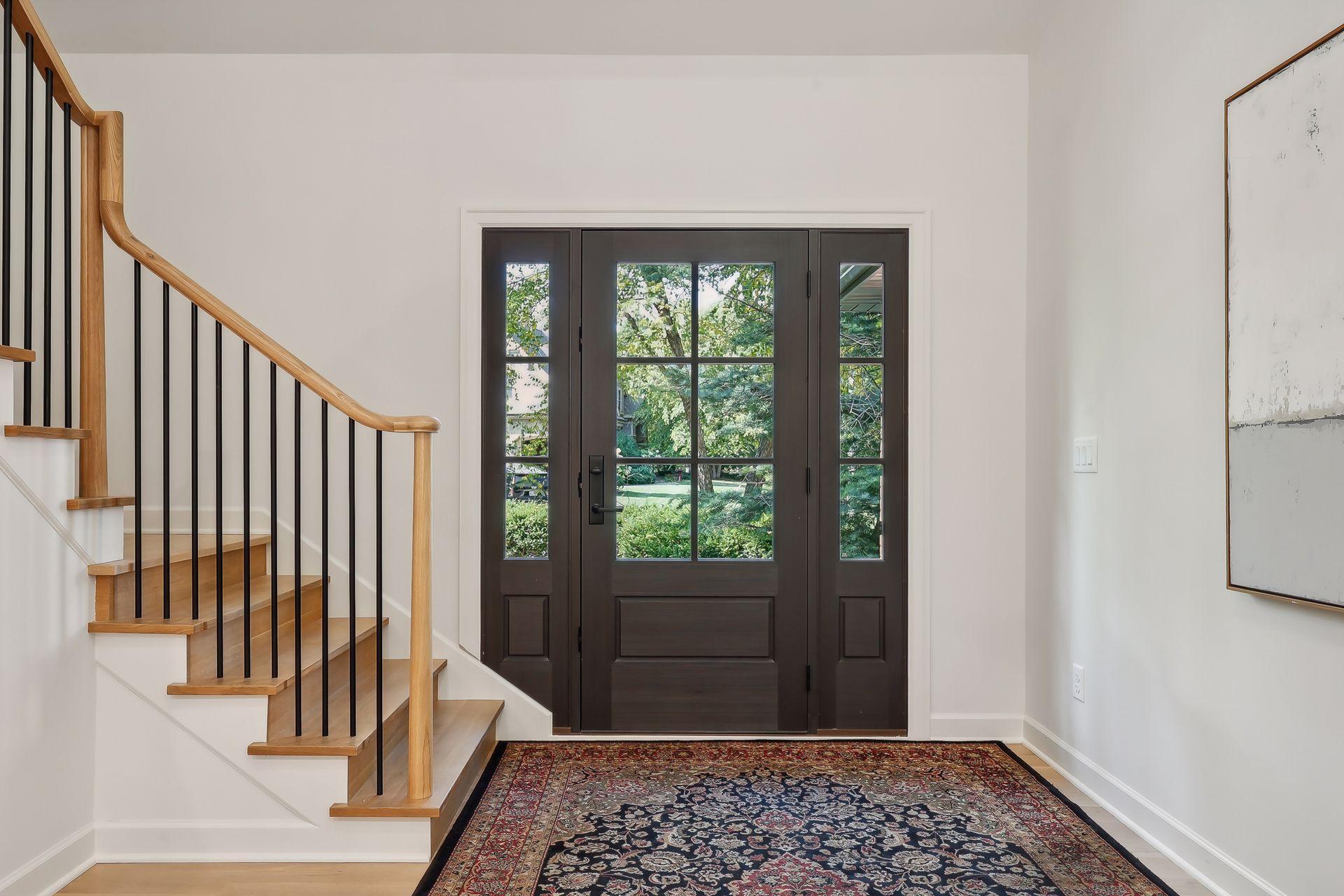 Step through the grand double doors into a foyer that defines luxury. This impressive entrance sets the stage for the rest of the home, combining sophistication and style for a truly welcoming atmosphere.
