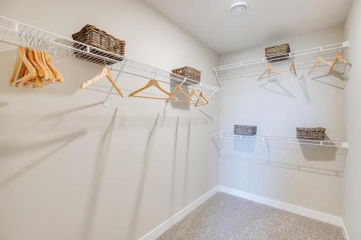Expansive walk-in closet to satisfy any wardrobe! *Photos of model home, finishes and options will vary.