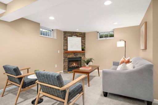 Comfy gatherin space in front of LL fireplace