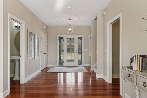 Step inside to discover a beautifully updated home with enameled millwork, freshly painted walls and ceilings and gorgeous cherry hardwood floors.