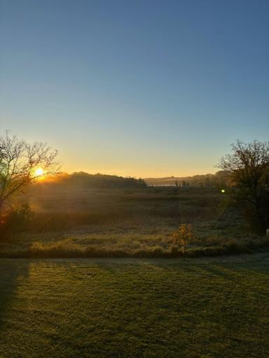 Enjoy watching the sun rise over the natural setting.