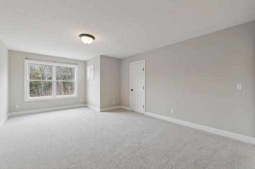 The upper level houses an additional four Bedrooms - three of these rooms feature walk-in closets.