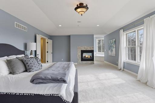 An inviting gas fireplace helps to create a cozy atmosphere.