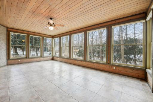 Large 3 seasons Porch overlooks the backyard