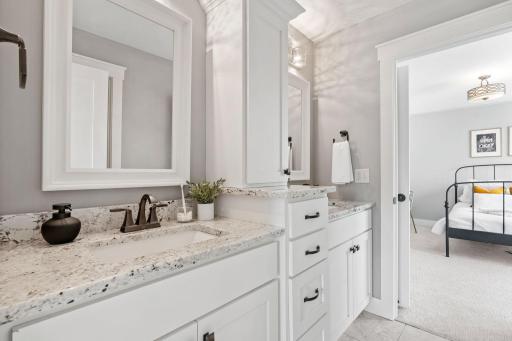 This walk through bath is shared by the second and third bedrooms.