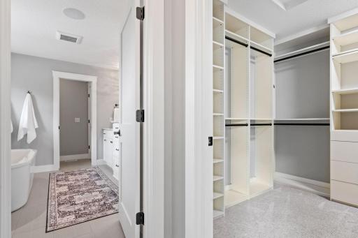 The private primary bath and walk in closet.