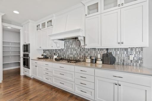 The tile backsplash adds style to this bright kitchen.