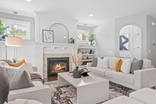 Recessed lighting and multiple windows create a bright atmosphere.