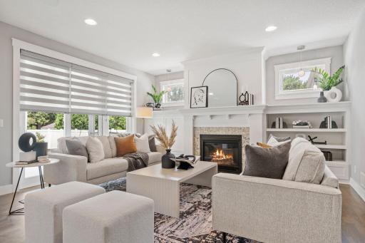 The fireplace is the focal point of this cozy living room area.