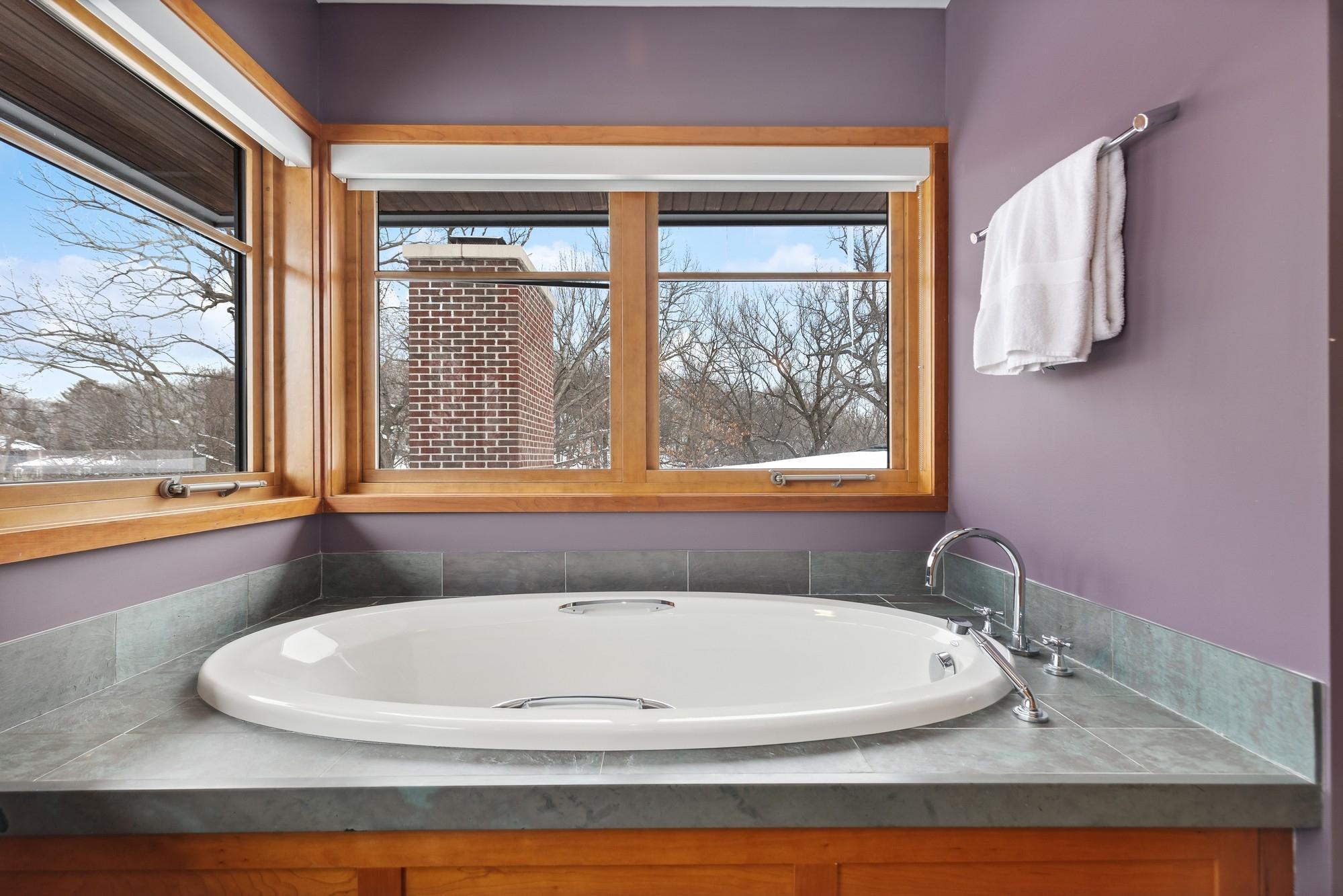 Slate Finish Around Tub and Corner Windows