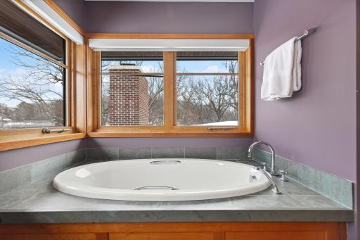 Slate Finish Around Tub and Corner Windows