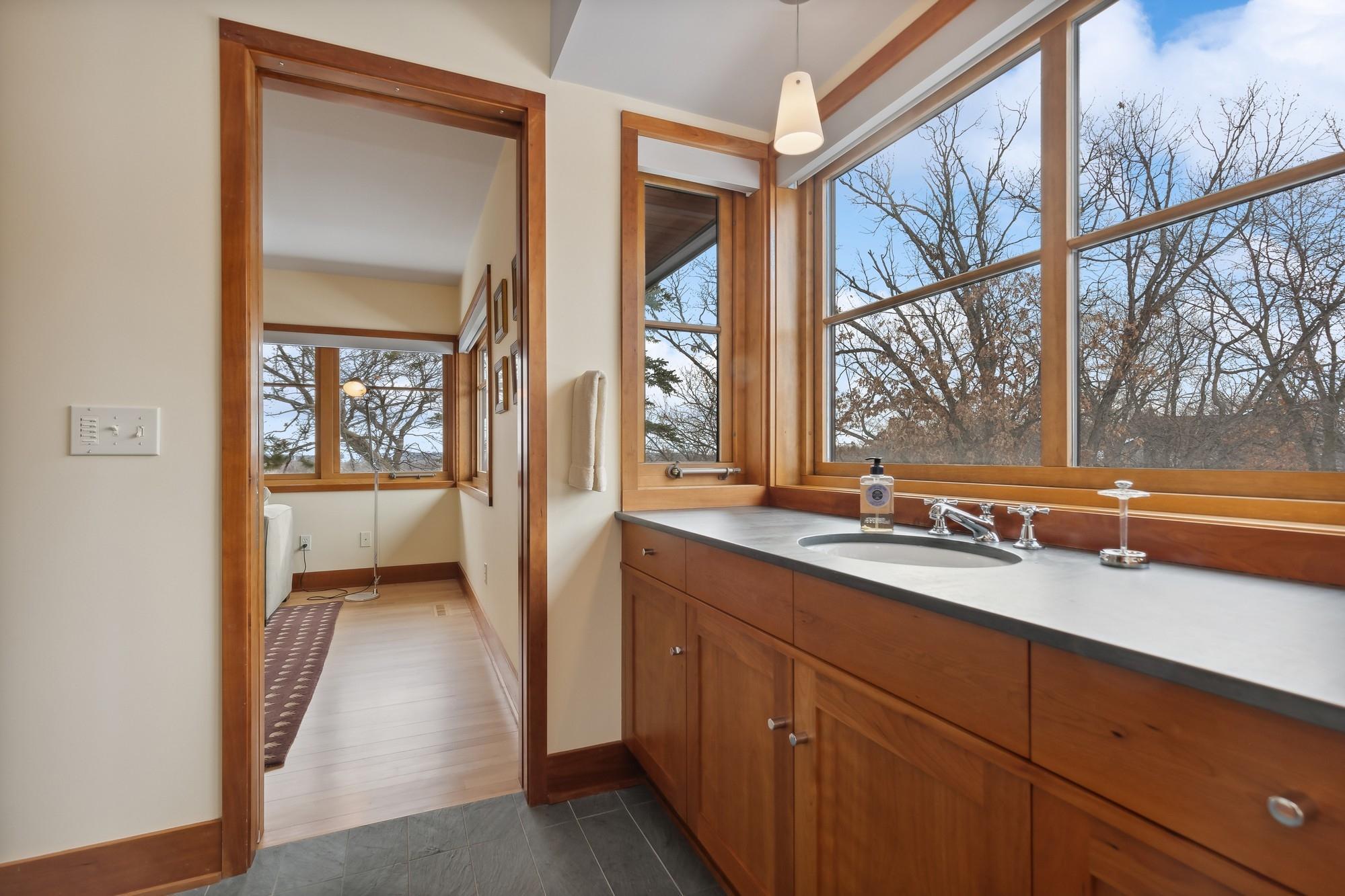 Jack and Jill 3/4 Bath Between Two Additional Bedrooms on Second Floor with Infloor Heat, Slate Counters and Floor plus Ceramic Shower