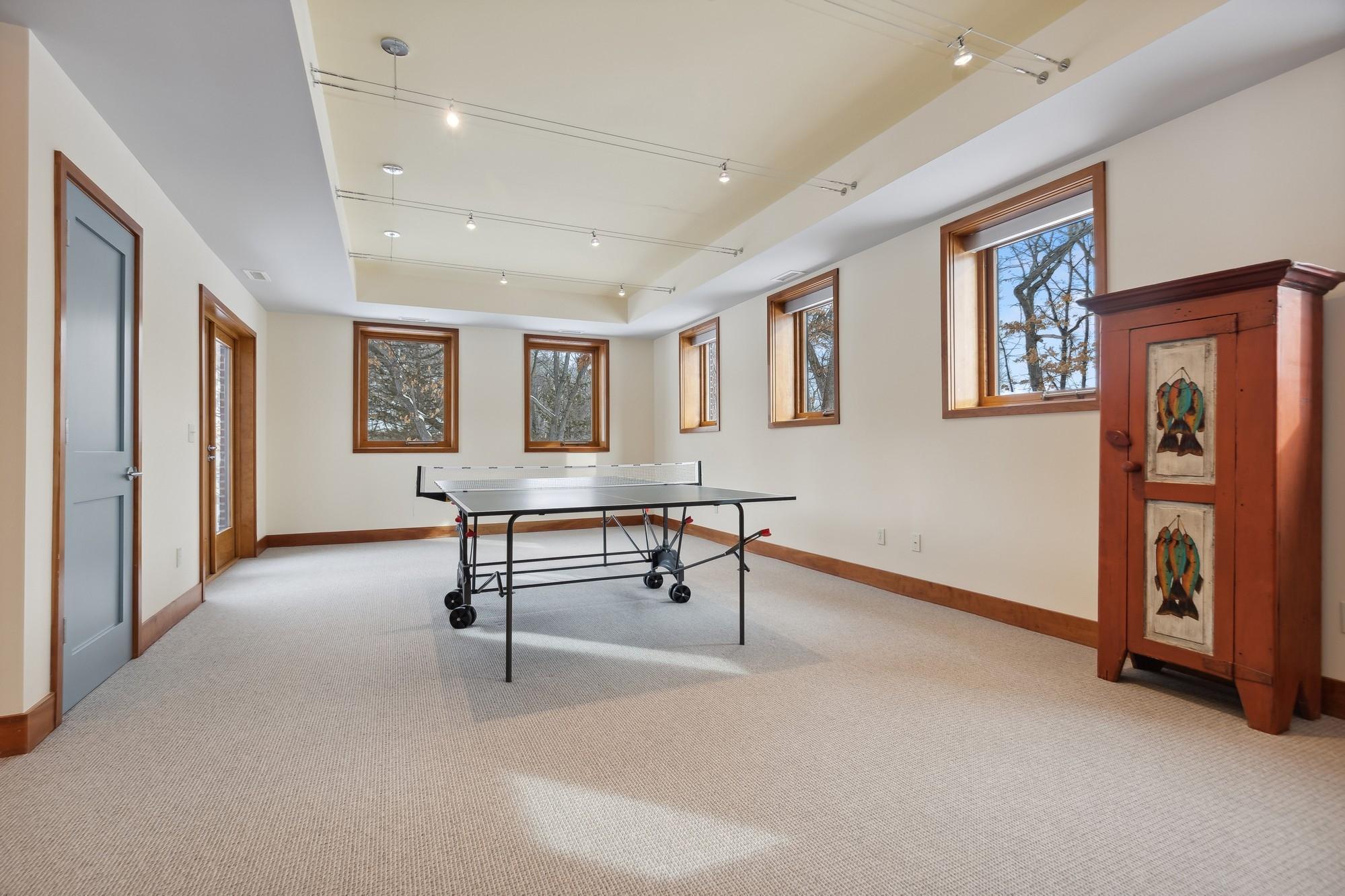Game Room with Walkout to Patio and Tennis Court