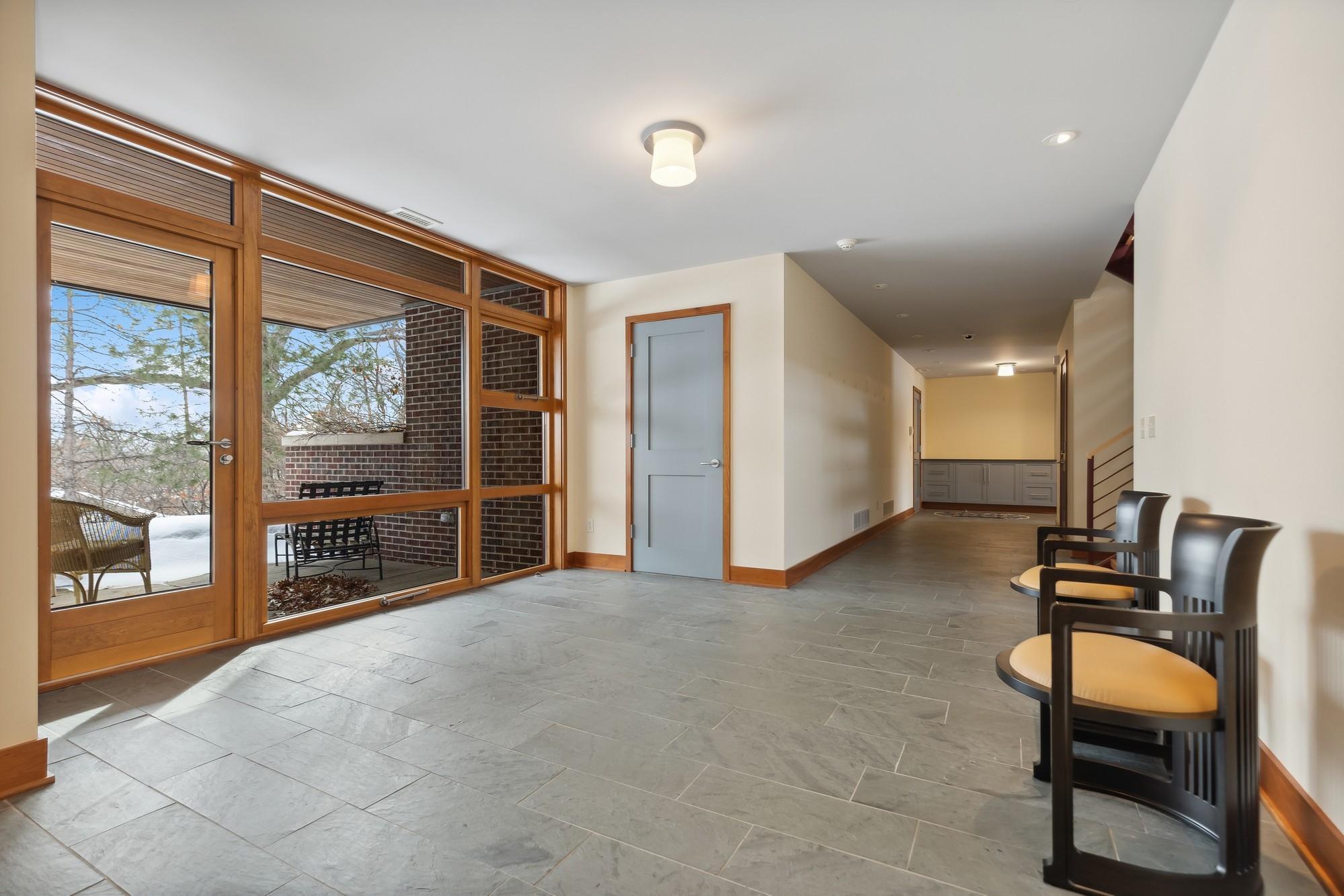 Slate Floors and Lower Level Patio to Backyard