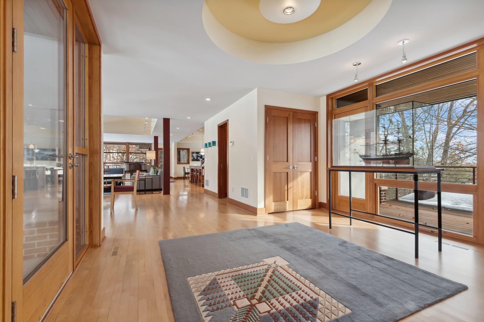 Beautiful Maple Flooring and Cherry Millwork throughout Home