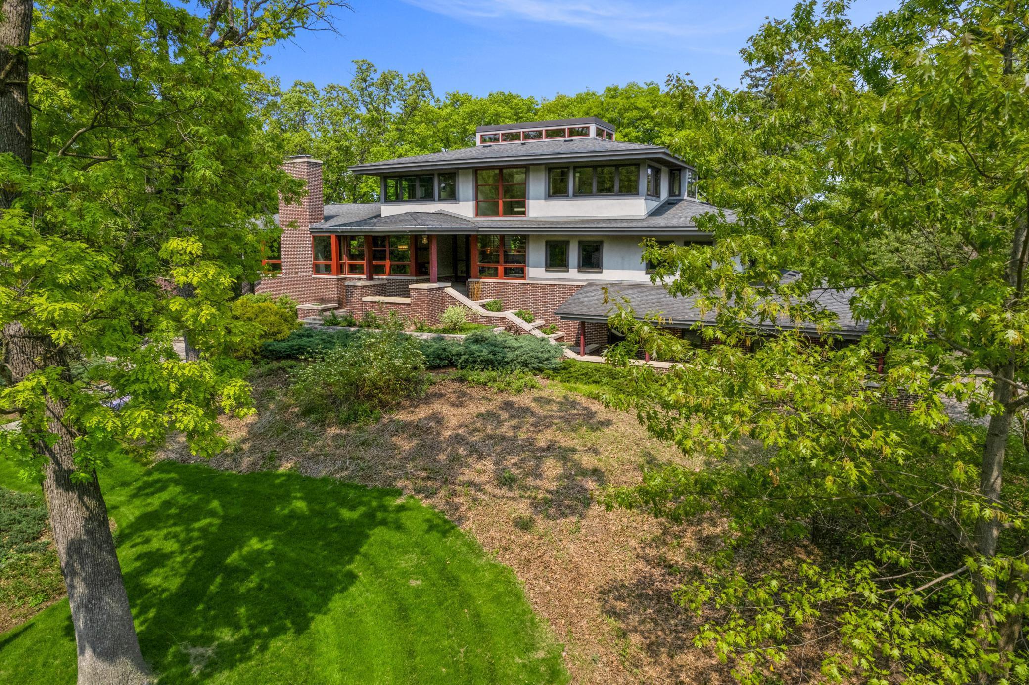 Landmark Indian Hills Residence Situated on Totally Private and Wooded Hilltop Setting