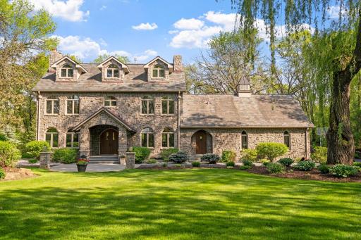 Storybook stone cottage perfectly situated on 5 acres of picturesque Credit River landscape!