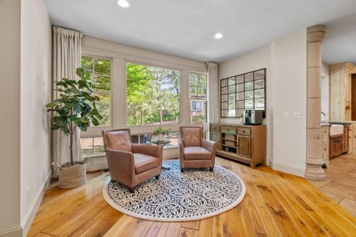 Rustic walnut wood flooring - sitting area off the kitchen