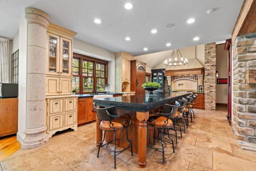 Cusotm cabinetry offers an eclectic combination of rustic butternut, hickory and a glazed enamel. These were hand crafted to resemble antique furniture and are truly one-of a kind!