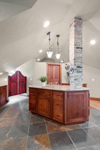 Unique center island features hickory inset doors - two sinks
