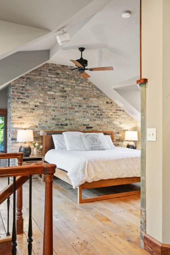 Rustic 7"w solid pine flooring with exposed iron nailheads - One of a kind owner's retreat!