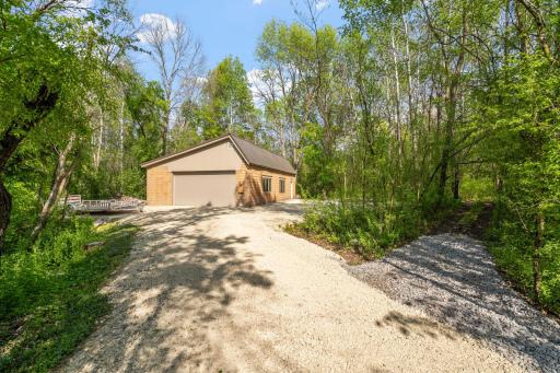 Shed has new roof, windows, interior walls and ceiling paneling. New class 5 rock provides a great space for parking trailers and toys