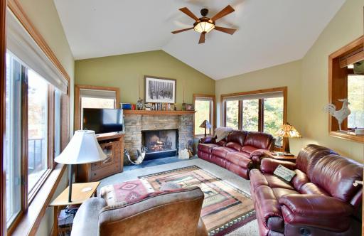 Amazing family room with oversized wood burning fireplace, stone surround, incredible hang out & relax space!