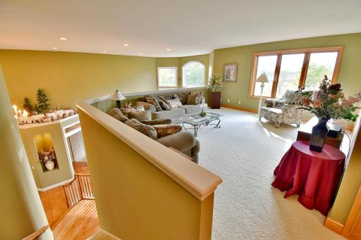 Gracious (18.4x17.2) upstairs loft overlook entryway and living room vault space.