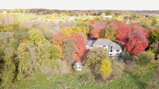 Aerial drone view of back of home (5.86 acres)