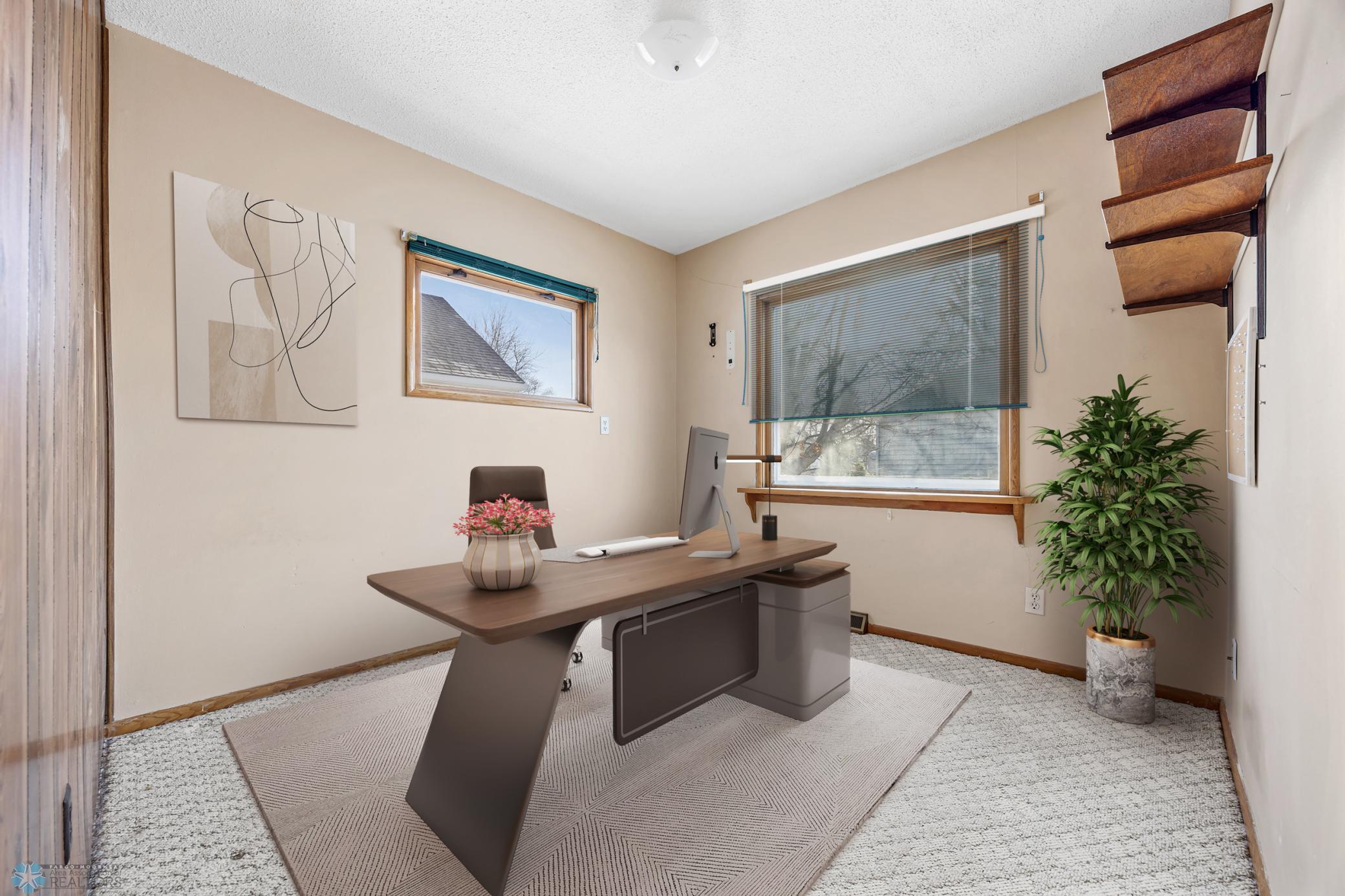 Main floor bedroom 1- virtually staged