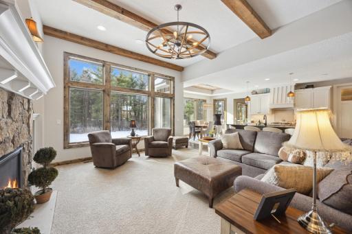 The outdoor views with the pine trees makes you envision a warm fireplace watching the snow gently fall on the majestic white pines in your own private oasis.