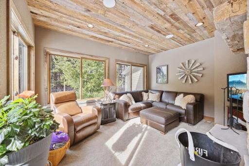 Porch/Den right off the kitchen is a great space to enjoy with a roaring "real" fire and a good book!