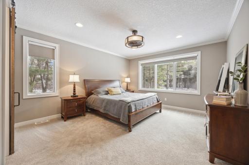 Large Main floor primary has ensuite bath and nice views.