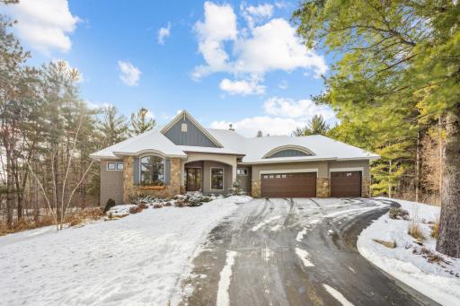Beautiful exterior with stone and cementboard exterior. Terrific front porch at entry.