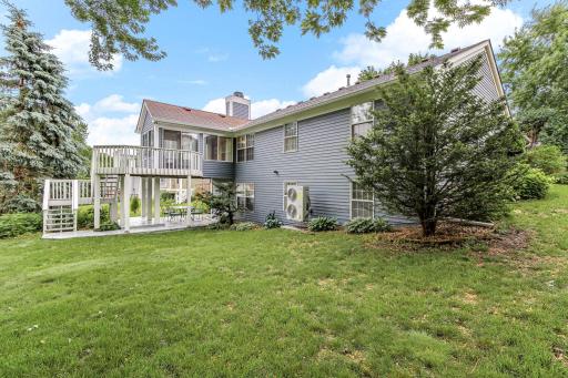 With a 3-season porch, deck, covered patio and a big back yard, this home is made for relaxed living and entertaining
