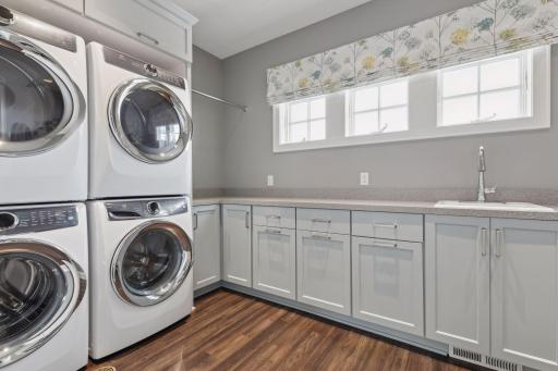 Bedroom level Laundry with 2 washers and 2 dryers
