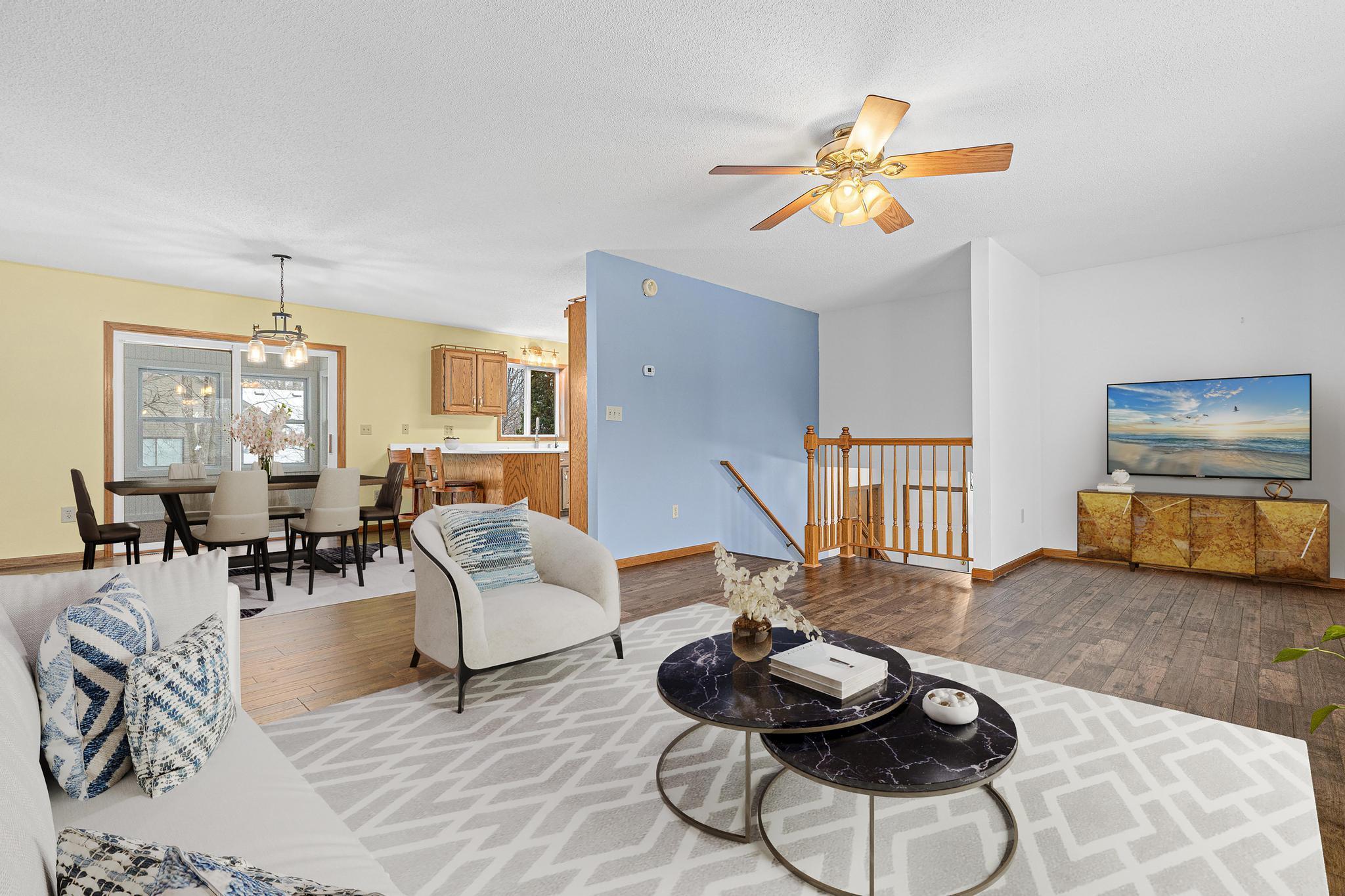 Digital staging of living and dining room.